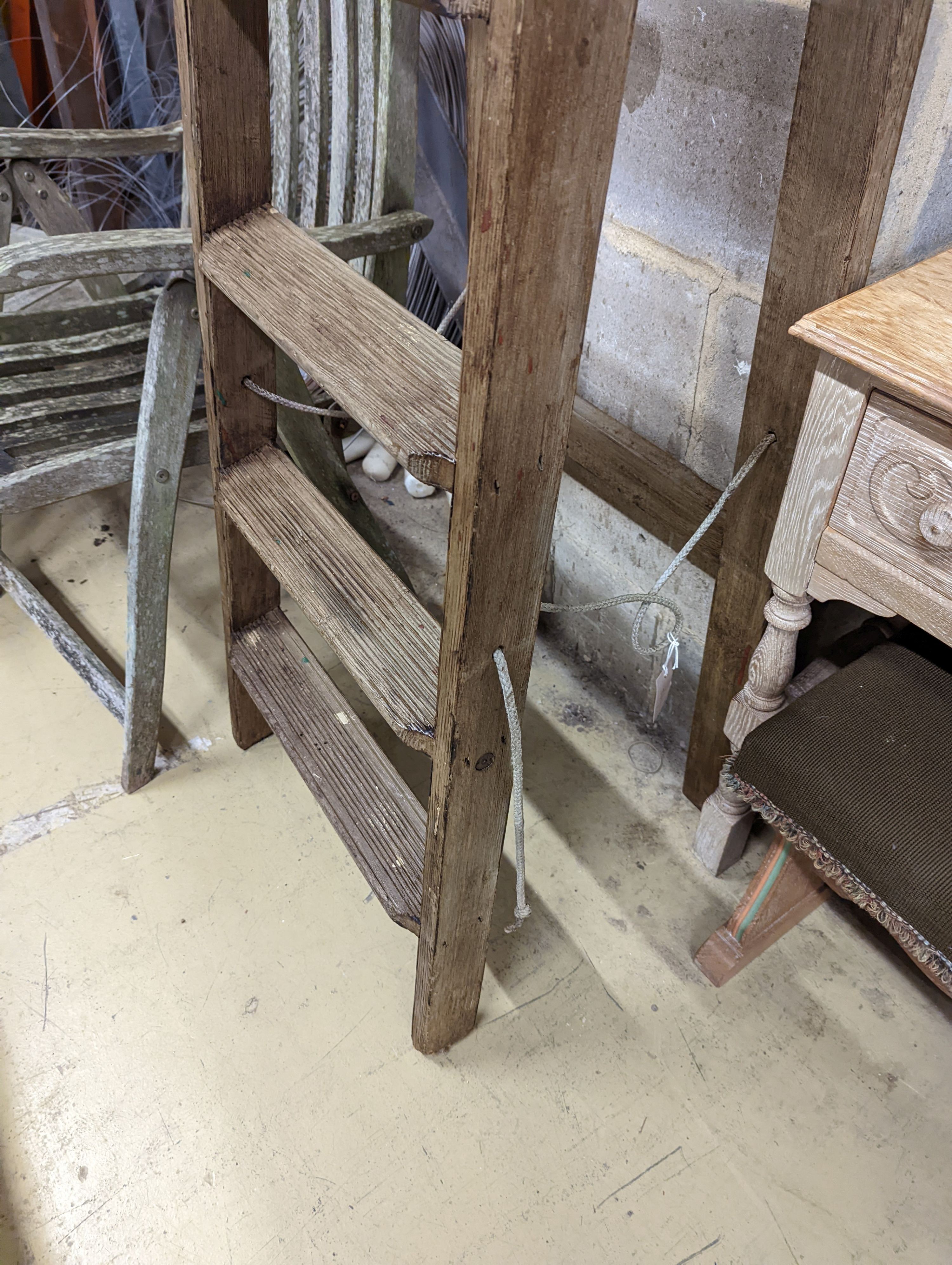 A vintage 8 tread wooden step ladder. H-224cm.